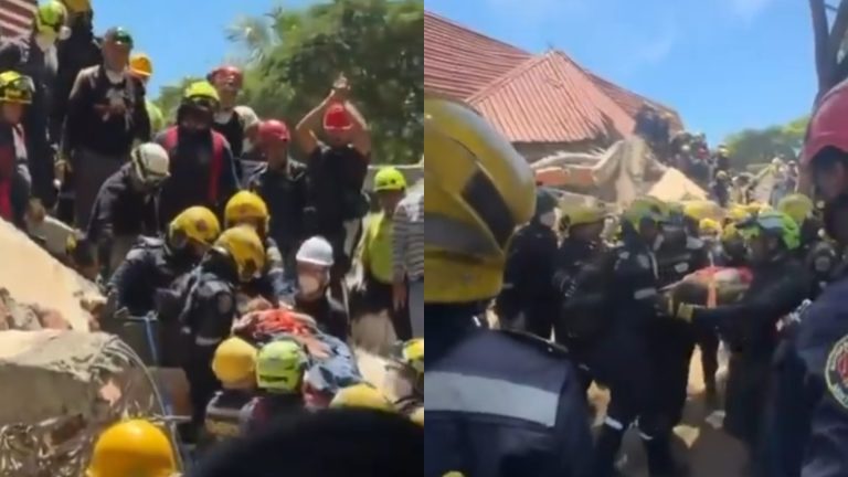 Διασώστες απεγκλωβίζουν τη Ντιάνα Τρονκόσο από τα συντρίμμια.
